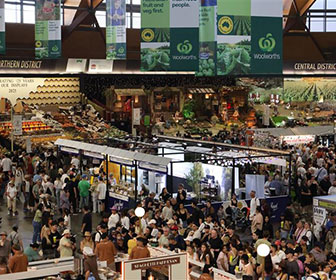 Crowds browsing fresh produce and food stalls inside the Woolworths Fresh Food Dome at the Sydney Royal Easter Show.